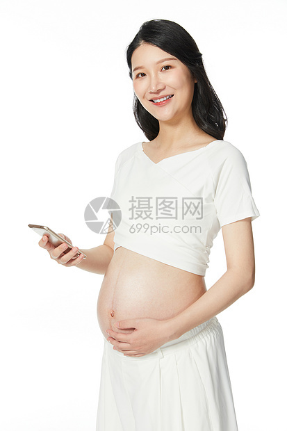 年轻孕妇玩手机图片