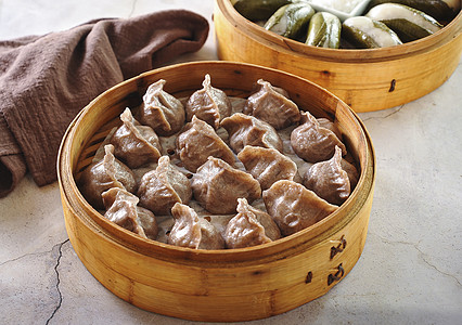荞麦驴肉蒸饺美食背景图片