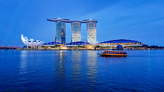 地标鱼尾狮新加坡金沙酒店的傍晚时刻背景