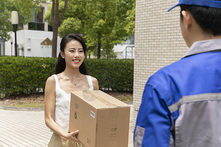 快递小哥上门取件寄快递服务图片素材