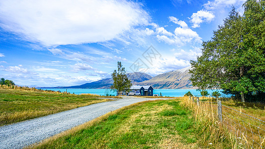 湖边小路新西兰通往湖边的田园小路背景