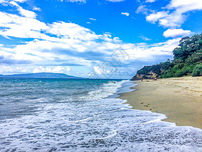 美丽滨海城市菲律宾海豚湾风光背景