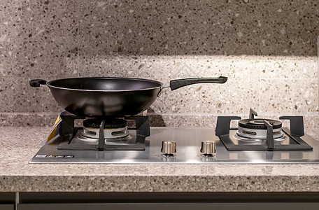 厨房用品厨具不锈钢锅与燃气灶台高清图片