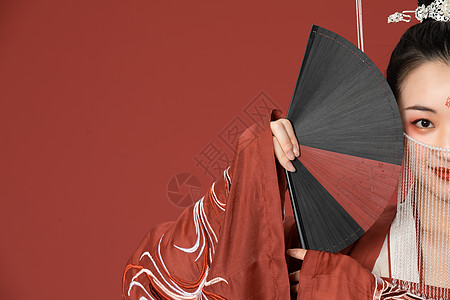 传统中国风扇子古风汉服美女拿扇子遮面背景