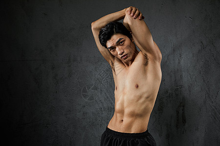 运动男性肌肉拉伸背景图片