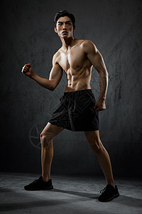 健身男性肌肉展示形象背景图片