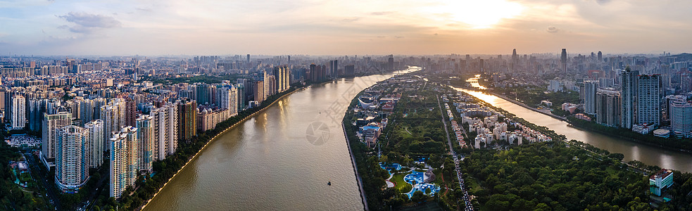 北上广深航拍广州二沙岛城市建筑群傍晚夕阳背景