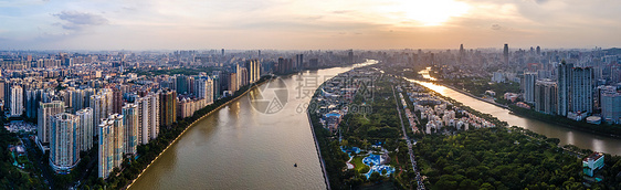 航拍广州二沙岛城市建筑群傍晚夕阳图片