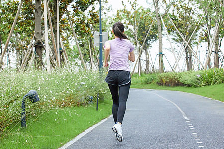 女性户外慢跑青年女性户外健身跑步背景