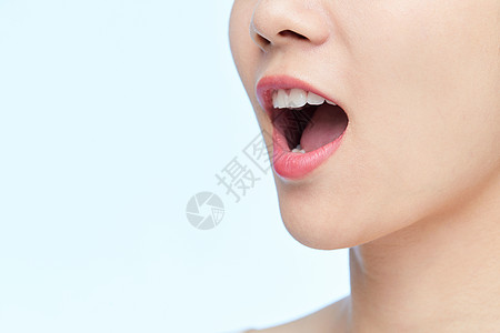 女人嘴巴年轻女性张嘴牙齿特写背景