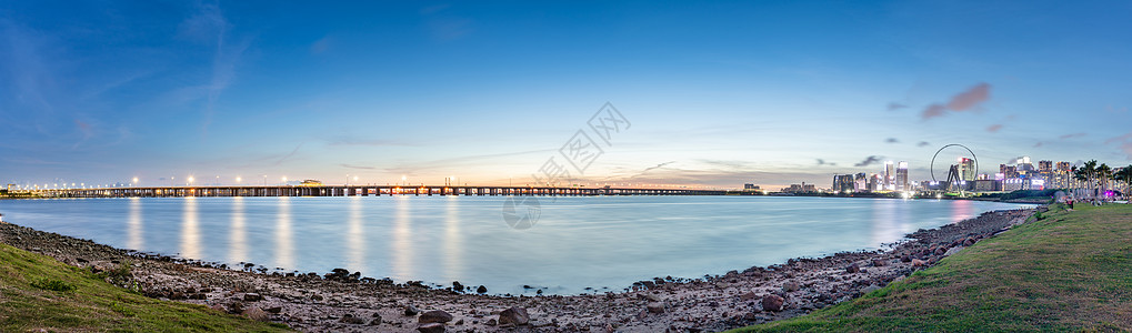 前海海边公园夜景全景广深沿江高速路背景图片