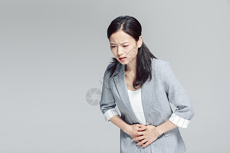 亚健康商务女性腹部疼痛图片