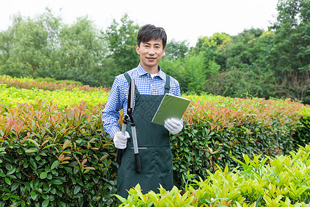 农场园丁记录植物生长状态图片