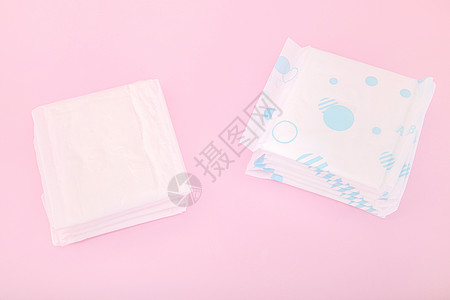 卫生用品粉色背景上的卫生巾背景
