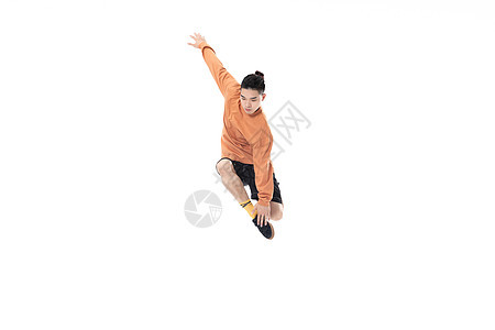年轻街舞男生跳跃技巧背景图片