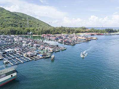 三亚游轮海南陵水县南湾猴山下疍家渔排背景