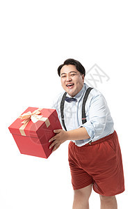肥胖男生抱着礼物盒图片