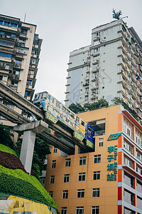 重庆轻轨重庆李子坝轻轨穿楼瞬间背景