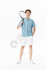 手握网球拍的男性运动员图片