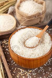 水稻海报木碗里的白色大米背景