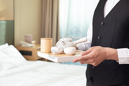 酒店客房服务员端茶具图片