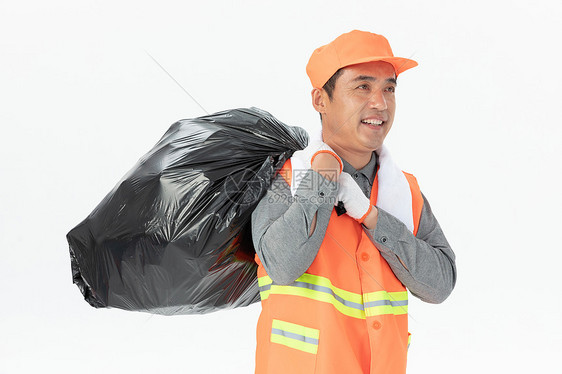背垃圾袋的环卫工人图片