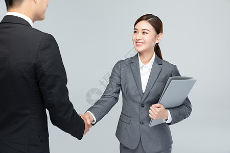 人物介绍展架与客户握手合作的商务女性背景