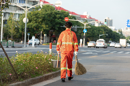 清洁工打扫街道打扫马路街道的环卫工人背景