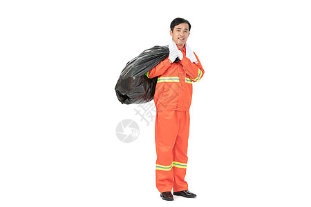 背着垃圾袋清理垃圾的环卫工人图片