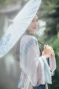 中国风古风汉服美女雨中撑伞图片