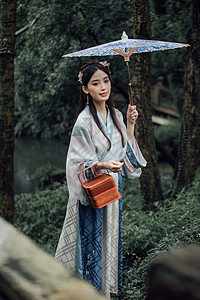 中国风古风汉服美女游园背景图片