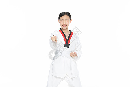 青少年女生练习跆拳道出拳背景图片