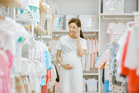 购物人孕妇商场购物打电话背景