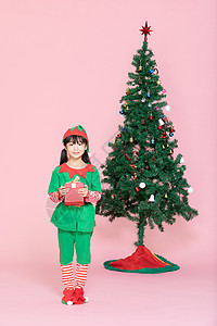 礼物盒卡通可爱小女孩cos装扮过圣诞节拿礼物盒背景