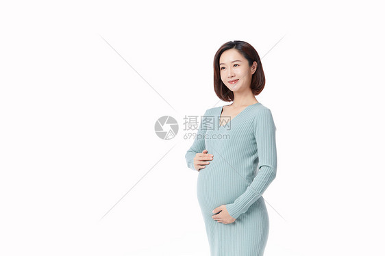 孕妇形象怀孕的人手摸肚子看前方图片