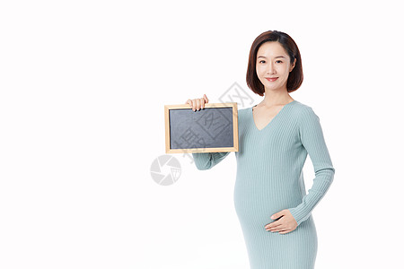 孕妇拿着黑板展示图片
