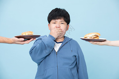 拒绝吃汉堡的男孩减肥的小孩捂嘴图片