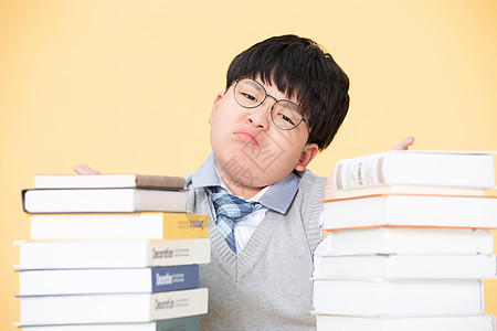 男孩作业多小男孩发愁图片素材