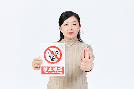 禁烟标识中年女性禁烟行动背景