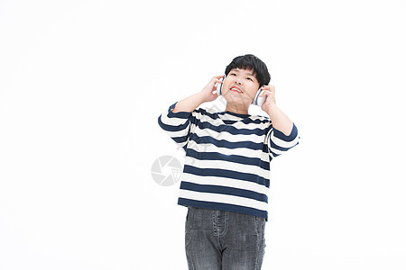 小孩在听音乐戴耳机的胖子小男孩图片