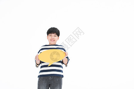 小男孩手举对话框开心的小胖子背景图片