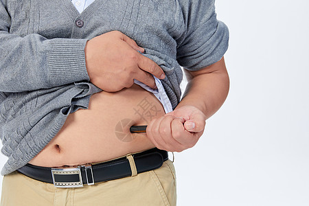 中年健康胰岛素注射的中年男性背景