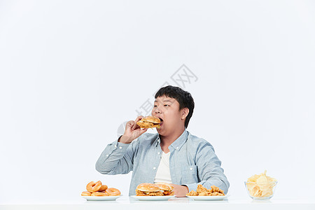 青少年肥胖吃汉堡图片