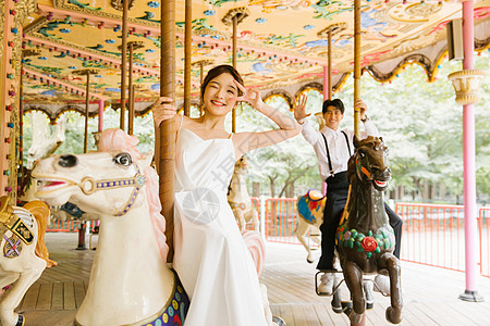 婚纱摄影海报情侣游乐园旋转木马婚纱写真背景