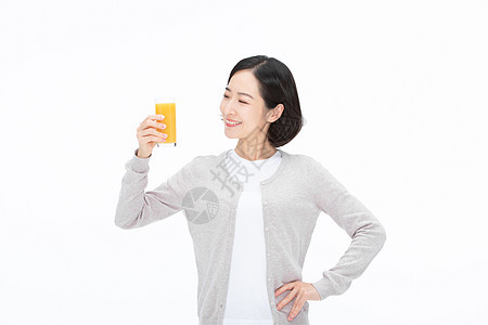 拿着果汁的女性喝果汁的人图片
