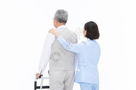 护士搀扶老人散步行动不便的人背景图片