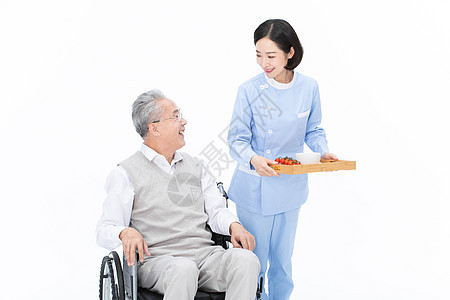 护士给老人端菜图片