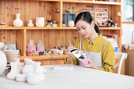 美女手工绘制脸谱面具背景图片