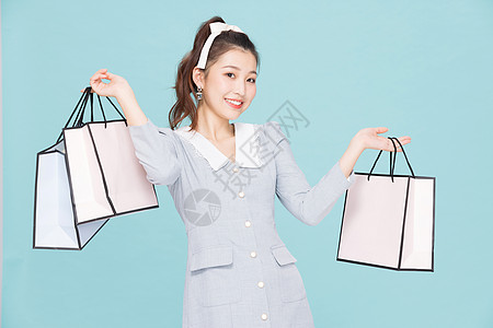 韩系可爱少女促销购物图片