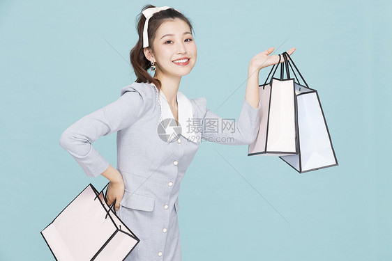 韩系可爱少女购物拎礼物盒图片